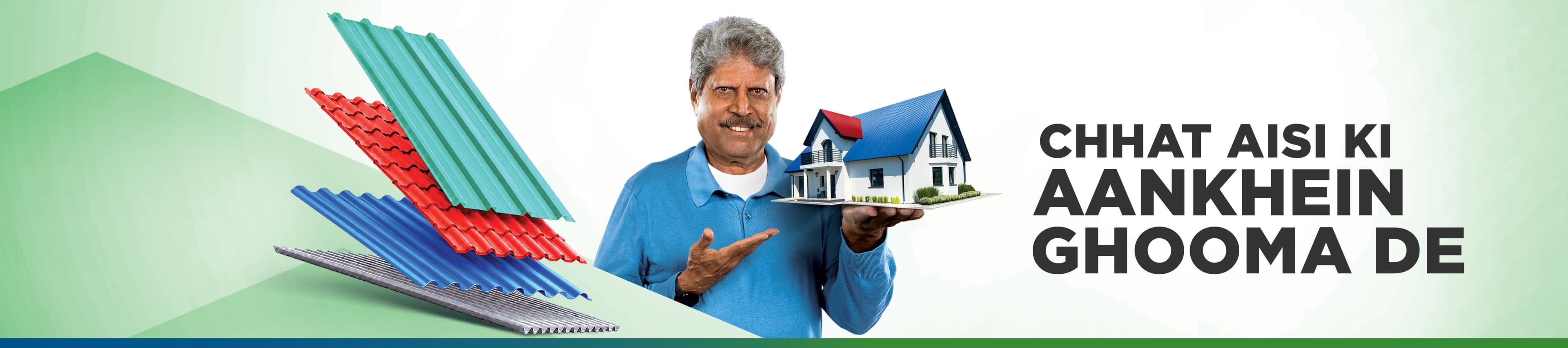 Teal, red, blue and galvanised sheets fanned out beside the brand ambassador holding a model house